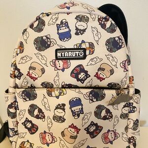 Nyamuto Cream Backpack with Cartoon Print